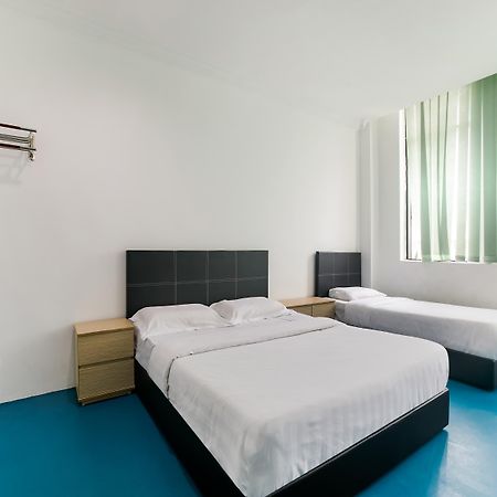 SPOT ON 89726 Capsule Inn Kota Kinabalu Extérieur photo