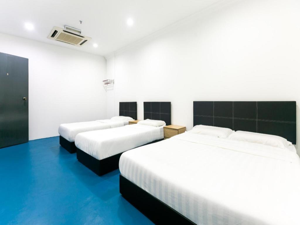 SPOT ON 89726 Capsule Inn Kota Kinabalu Extérieur photo