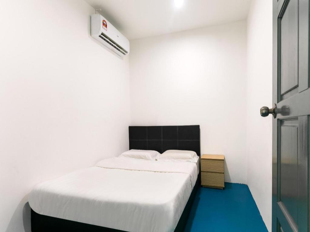 SPOT ON 89726 Capsule Inn Kota Kinabalu Extérieur photo